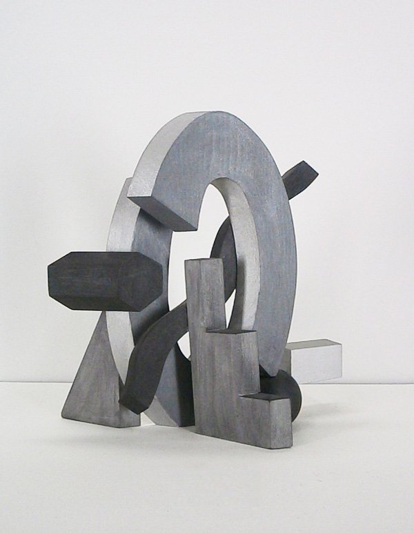 John Okulick (b. 1947) Californian: UNTITLED GRAY OVALS, 1986, painted wood construction, signed and dated twice underneath, 14 x 14 x 6 , in good studio condition.