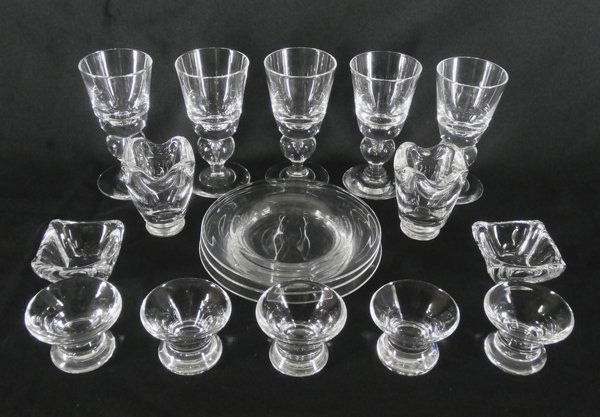 Decorative Arts: Steuben & Daum Glass (seventeen): Steubin: Five 5” Tear Drop crystal wine glasses; Five 2”finger bowls; Three 6” plates with usual wear underneath; Two 3” crystal toothpick holders; All hallmarked underneath; Together with two