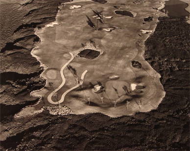 Marilyn Bridges (b. 1948) American: HYATT GOLD COURSE OVER LAVA, HAWAII, 1990, gelatin silver print, image 16 x 20 inches, framed.