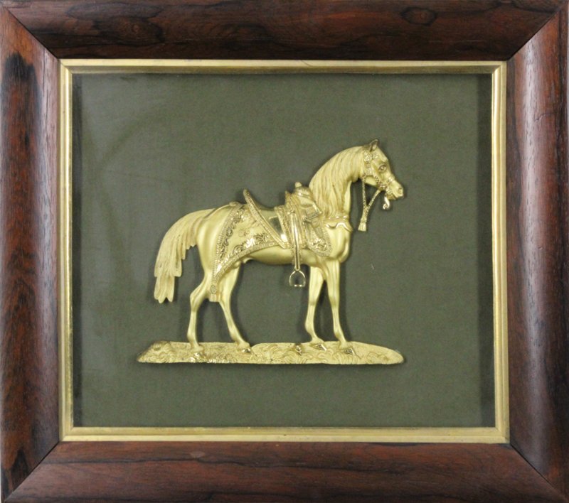 Decorative art: Ormolu Horse: A gold ormolu relief, 7 x 8 ”, in antique frame, with glass, frame 15 x 17 ”, in good antique condition.
