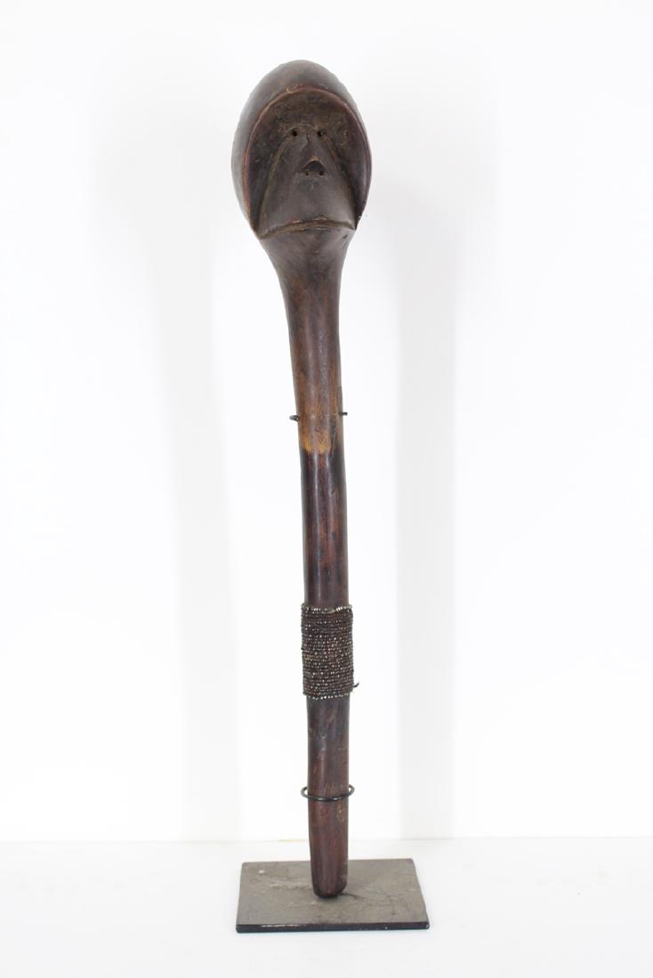 African Art: Dan: SCEPTER, carved wood with patina and beads, 27” tall, with stand, in good aged condition. Provenance: from the collection of William A. Emboden PhD. F. L. S.