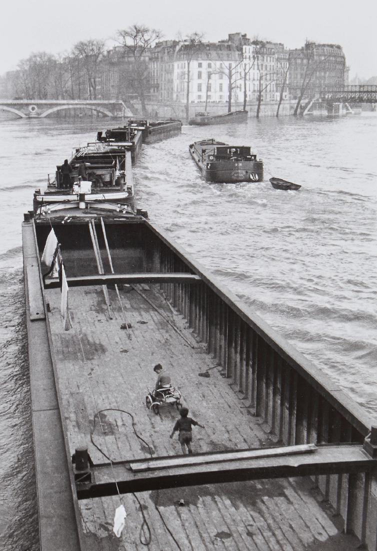 ** Willy Ronis (1910-2009) - La Peniche aux Enfants,: Gelatin silver print, printed 1994, signed in ink in the margin, titled, dated and annotated in pencil with photographer's copyright stamp verso, 34.7 x 24.3cm (13 5/8 x 9 1/2in) IMPORTANT: This lot i
