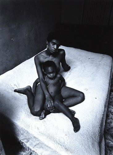 Bruce Davidson (b.1933) east 100th street, new y: Bruce Davidson (b.1933) east 100th street, new york city, 1966Gelatin silver print, printed c.1980s, signed in pencil on verso. paper size 60.5 x 50.8 cm (23_ x 20 in.) image size 56.5 x 42.