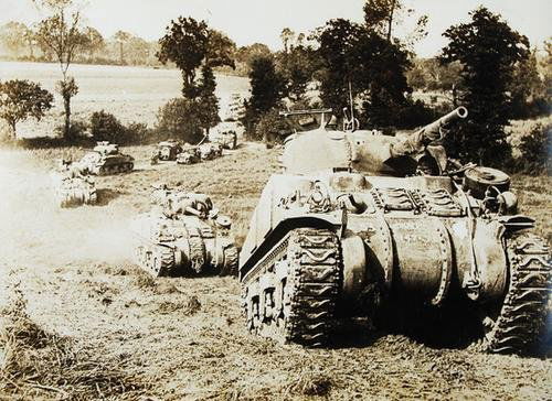 Robert Capa (1913-1954) & Cornell Capa (1918-2008: Robert Capa (1913-1954) & Cornell Capa (1918-2008) avanco britanico, 1967Four gelatin silver prints, printed c.1967, two are signed in pencil on verso with captions attached, 30 x 39cm (12 x 1
