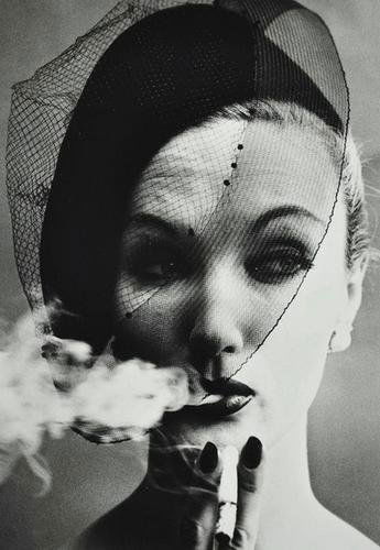William Klein (b.1928) Smoke and Veil, Paris, 1958: William Klein (b.1928) Smoke and Veil, Paris, 1958Gelatin silver print, printed later. Signed, titled and dated in pencil on the verso. 45.5 x 32 cm. (17 3/4 x 12 1/2 in.)(1)