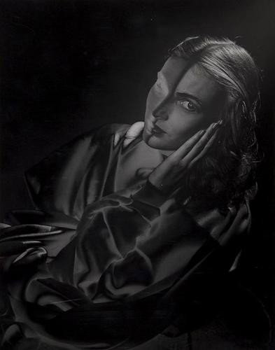Erwin Blumenfeld (1897 - 1969) Untitled, ca. 1940: Erwin Blumenfeld (1897 - 1969) Untitled, ca. 1940Vintage solarised ferrotyped gelatin silver print, annotated in blue ink in unknown hand verso, 34 x 27 cm (13 3/8 x 10 5/8 in.). Provenance: L