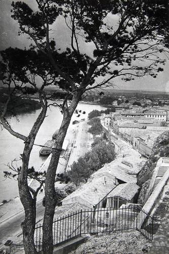 Brassaï (Gyula Halász, 1899-1984) View of the Rive: Brassaï (Gyula Halász, 1899-1984) View of the River Rhône, ca. 1950sVintage ferrotyped gelatin silver print, photographer's stamp with negative number in blue ink verso, 21.5 x 14.5 cm (8 1/2