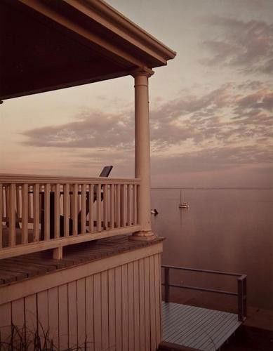 Joel Meyerowitz (b.1938) Porch at Dusk Provincetow: Joel Meyerowitz (b.1938) Porch at Dusk Provincetown, 1977Chromogenic contact print, printed 1979, signed, dated and numbered 18/25* in black ink verso, 25.5 x 20cm (10 x 20in) * <
