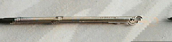 RARE SILVER SPINK & SON PENCIL HOLDER, 1896: A SILVER SPINK & SON PENCIL HOLDER English, London Hallmark, 1896 signed spink & son with sponsor's mark i.m.s (John Marshall Spink) on the plain polished case with ring decorated slide for th