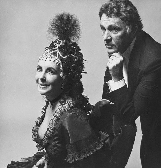 Cecil Beaton (1904-1980) Elizabeth Taylor & Richar: Cecil Beaton (1904-1980) Elizabeth Taylor & Richard Burton, at the Rothschild Proust Ball, 1971Gelatin silver print, flush mounted to contemporary card, signed on the mount in red pencil, phot