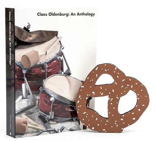 Claes Oldenburg (b.1929) Pretzel & An Anthology: Claes Oldenburg (b.1929) Pretzel & An Anthologythe die-cut cardboard multiple printed in colours, 1994, initialled in black felt-tip pen verso; with the book An Anthology, 1996, signed by the