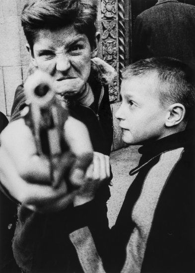 William Klein (b.1928) Gun 1, New York, 1955: William Klein (b.1928) Gun 1, New York, 1955Gelatin silver print, printed later, signed, titled and dated in pencil with photographer's stamp verso, 45 x 32.5cm (17 3/4 x 12 3/4in) Provenanc