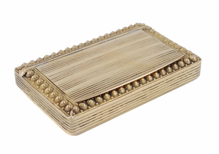 A French silver gilt rectangular snuff box by Clau: A French silver gilt rectangular snuff box by Claude-Louis Jonquoy, 1st standard for Paris 1819-1838, Association of Gold and Silversmiths mark, reeded overall, the cover with a reeded bead o