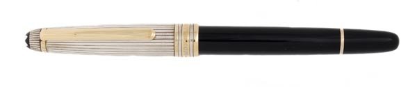 Montblanc, Solitaire Doue, a silver coloured and b: Montblanc, Solitaire Doue, a silver coloured and black resin fountain pen, the fluted cap with gold plated trim, and black resin barrel, with fine two colour nib, in a Montblanc box, with ser