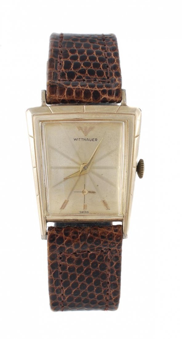 Wittnauer, a 1950s stainless steel and gold filled: Wittnauer, a 1950s stainless steel and gold filled wristwatch, ref. 2022, no.969054, the two piece trapezium case with gilt engine turned dial, radial markers extending across to the bezel, t
