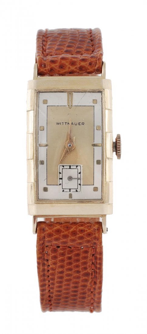 Wittnauer, a 1940s 14 carat gold wristwatch, no. 2: Wittnauer, a 1940s 14 carat gold wristwatch, no. 283831, the two piece notched rectangular case stamped '14k' with two tone matte silver and gilt dial, applied gold cuboid markers and tapered