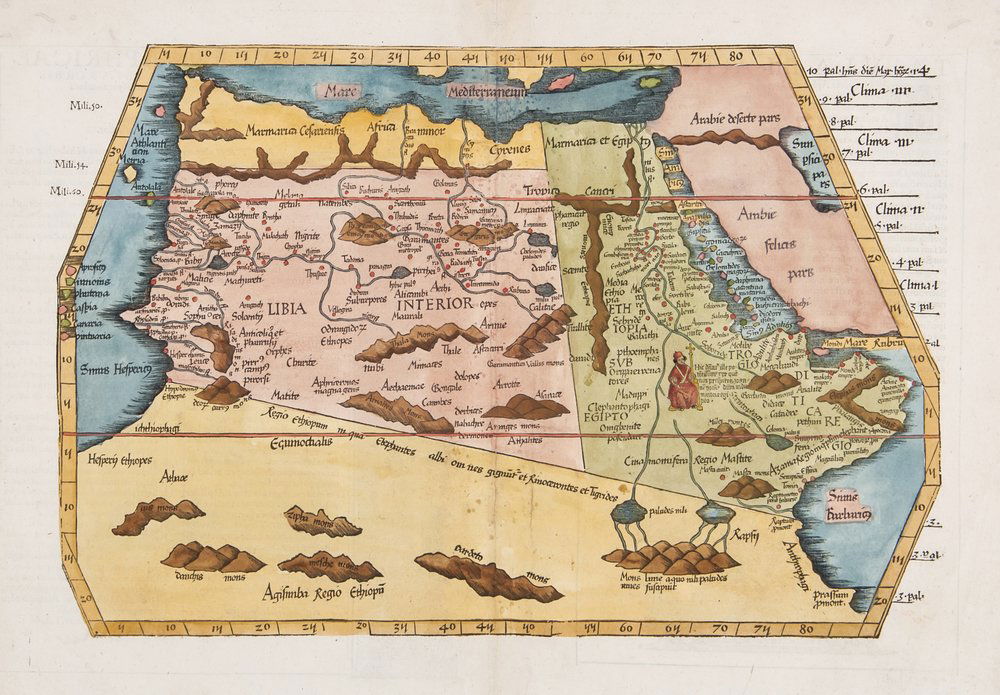 Fries (Lorenz) Tabula IIII Aphricae: Fries (Lorenz) Tabula IIII Aphricae,map of North Africa, based upon the work of Waldseemuller, woodcut with hand-colouring, 360 x 510mm., Latin text verso with woodcut borders, central vertica