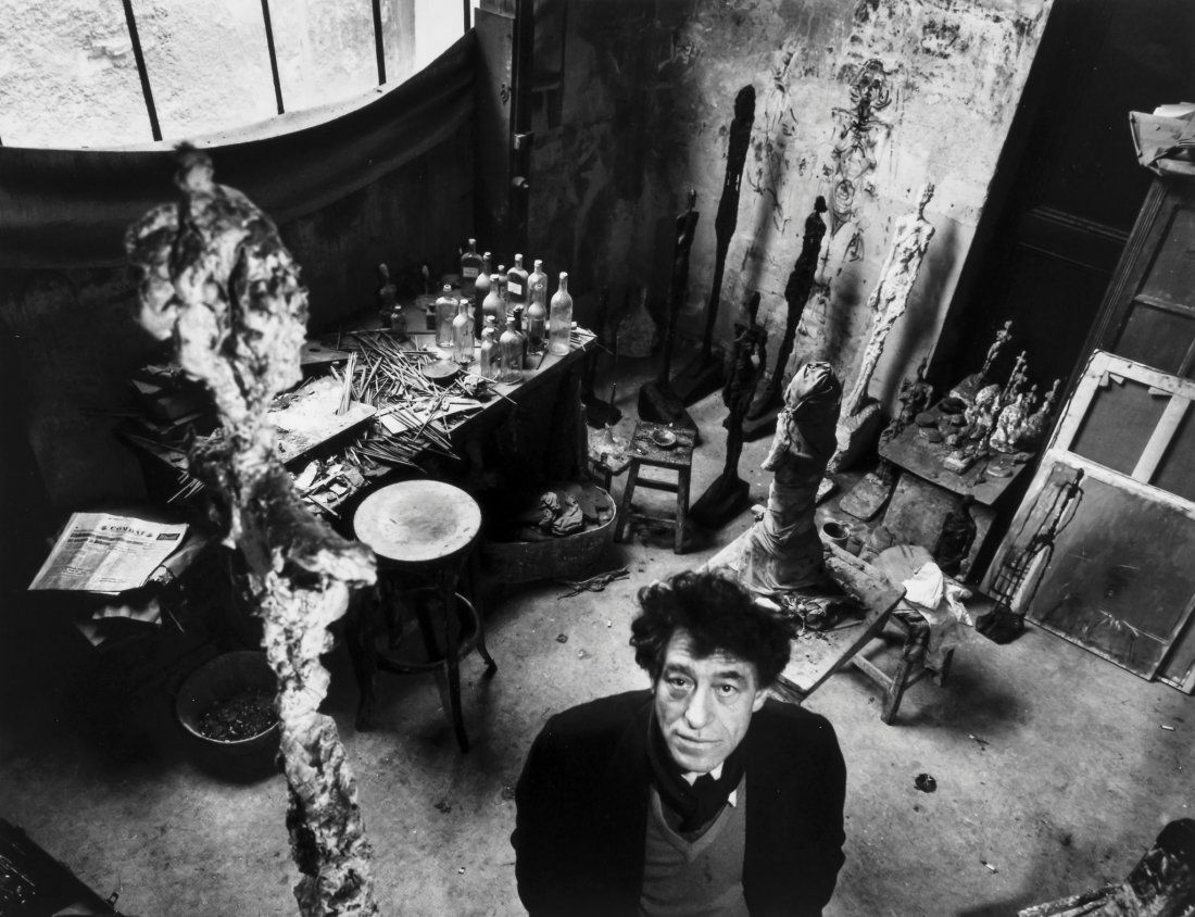 Robert Doisneau (1912-1994) - Giacometti dans son: Gelatin silver print, printed 1980s, signed in black ink in the margin, initialled, titled and dated in ink verso, 23.5 x 30.6cm (9 1/4 x 12in)