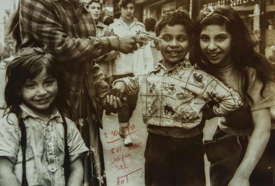 William Klein (b.1928) - Gun 2, near the Bowery, N: Gelatin silver print, annotated by the photographer in red crayon recto and in pencil verso, 21 x 31cm (8 1/4 x 12 1/4in) Provenance: Photographers' Fair; Private Collection, London This lot is accomp