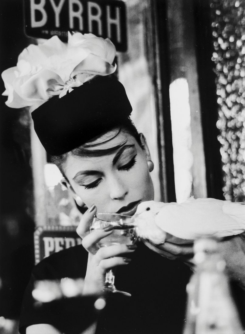 William Klein (b.1928) - Mary + Dove, Cafe Terrace: Gelatin silver print, printed later, signed, titled and dated in pencil verso, 37.5 x 27.4cm (14 1/2 x 10 3/4in) Provenance: Acquired directly from the photographer by the present owner