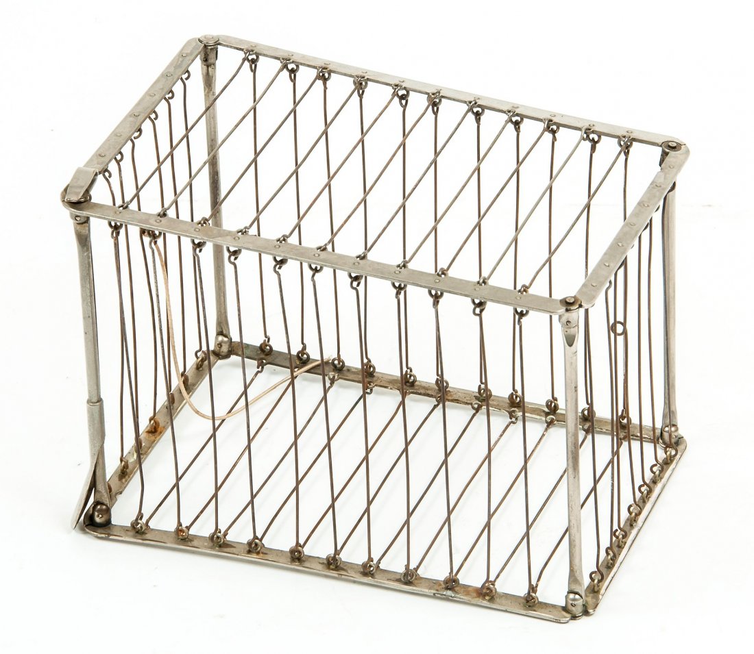 Vanishing Bird Cage,: chrome frame and bars, 170mm. by 110mm., 120mm. high , [John Martin , c.1935?].