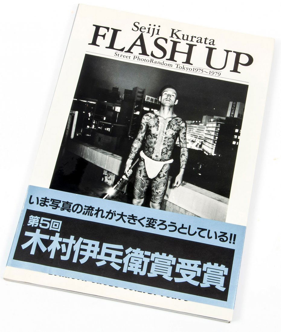 Seiji Kurata (b.1945) - Flash Up: Street Photo Random: Byakuya Shobo, Tokyo, first edition, signed in black ink by the photographer on title page, obi, dust jacket and original acetate jacket, 4to, 29.5 x 21cm (11 5/8 x 8 1/4in)