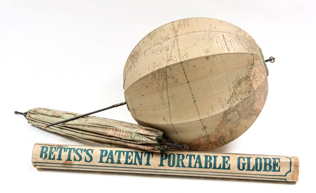 Betts (John) - Betts's Portable Terrestrial Globe,: later edition of this umbrella-mechanism 'pop up' globe, colour-printed linen on 8 gores over expanding metal frame, c.38cm. (15 in.) diameter at equator, central rod 72.5mm., some browning, surface d