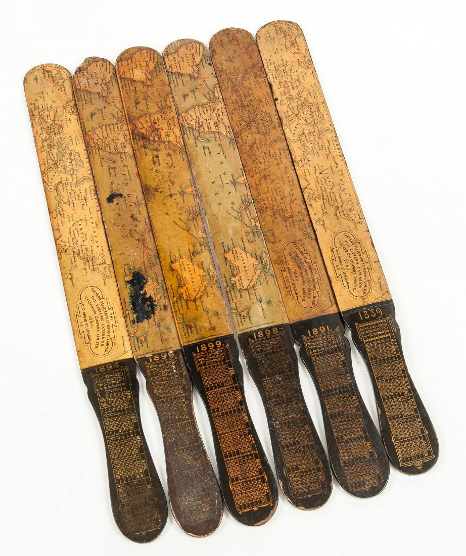 The Eastern Telegraph Company Ltd.- - A group of six: decorated with various lithographed maps of the world, each c.33 cm., dated between 1889 and 1899, (6).