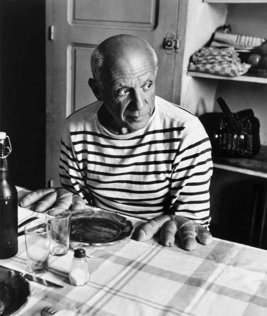 Robert Doisneau (1912-1994) - Les Pains de Picasso,: Gelatin silver print, printed later, signed in ink in the margin, signed, titled and dated in ink verso, 29 x 24.3cm (11 3/8 x 9 1/2in) IMPORTANT: This lot is sold subject to Artists Resale Rights, de