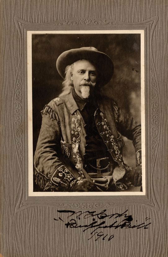 SP A mounted 22.3 x 14.7cm black and white half-length: SP A mounted 22.3 x 14.7cm black and white half-length photograph of legendary American frontiersman William Frederick Cody, better known as Buffalo Bill. Signed and dated in black ink on the mount be