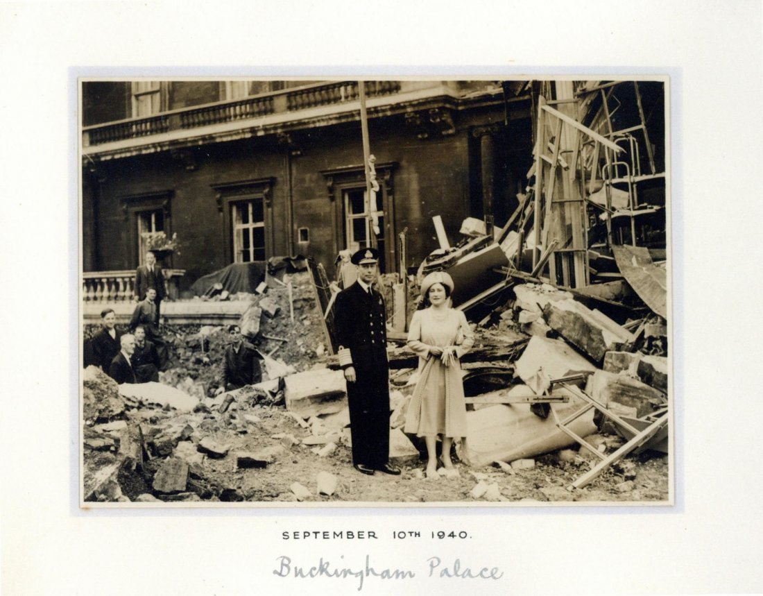 SP The Royal Christmas Card, for 1940, printed by: SP The Royal Christmas Card, for 1940, printed by Raphael Tuck, featuring a mounted black and white photograph of the King and his Queen Consort stood in ruins outside Buckingham Palace, clearly signe