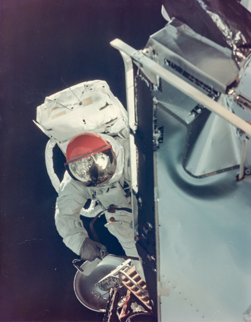 David Scott -: Large-format vintage chromogenic print on fibre-based Kodak paper, borderless, 27.7 x 35.5cm, A Kodak Paper watermark on verso, [NASA negative number AS9-19-2994] The visor of Schweickart s red helmet