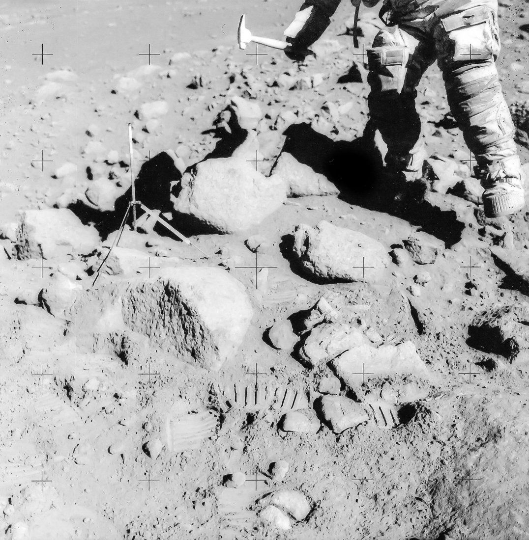 David Scott using his hammer in a field of boulders on: David Scott using his hammer in a field of boulders on the edge of Hadley Rille at station 9A, EVA 3, Apollo 15, August 1971 Three vintage gelatin silver prints, each 20.3 x 25.4cm (8 x 10in), numbere