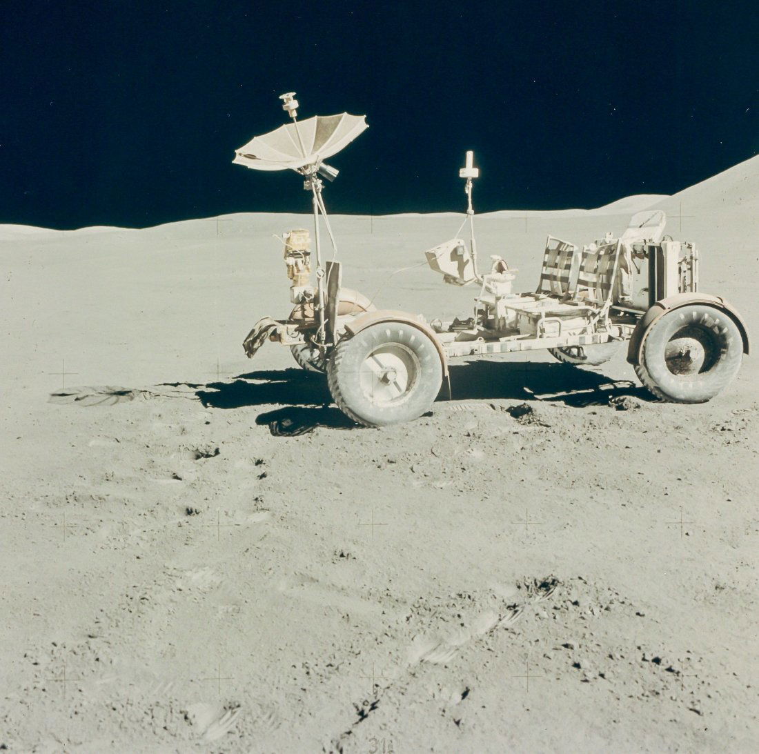 David Scott -: Vintage chromogenic print on fibre-based paper, 20.3 x 25.4cm (8 x 10in), A Kodak Paper watermark on verso, numbered NASA AS15-88-11901 in red in top margin Scott has driven the Rover to the best loca