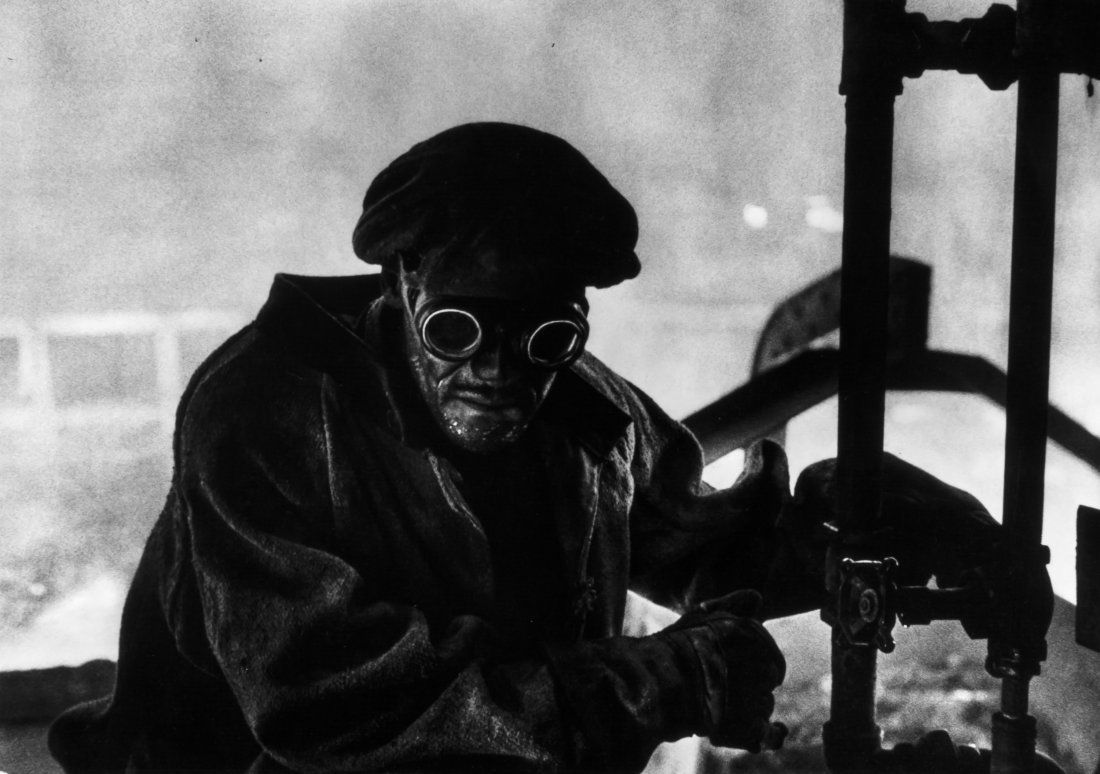 W. Eugene Smith (1918-1978) - Steel Worker, Pittsburgh,: Gelatin silver print, flush mounted to card, signed recto, titled in pencil with photographer's copyright, credit stamps on mount verso, 23.6 x 33.5cm (9 1/4 x 13 1/4in)** This lot has been imported f
