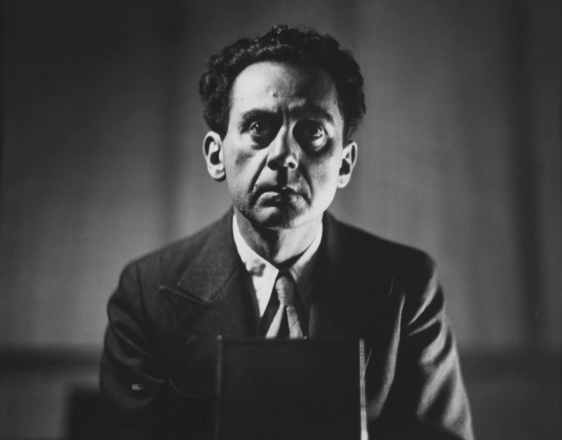 Man Ray (1890-1976) - Self-Portrait, ca.1935: Gelatin silver print, printed 1980 by Pierre Gassmann, annotated in pencil with various credit stamps verso including Man Ray Paris, A.D.A.G.P. and Pierre Gassmann , 22.6 x 28.5cm (8 7/8 x 11 1/4in) *