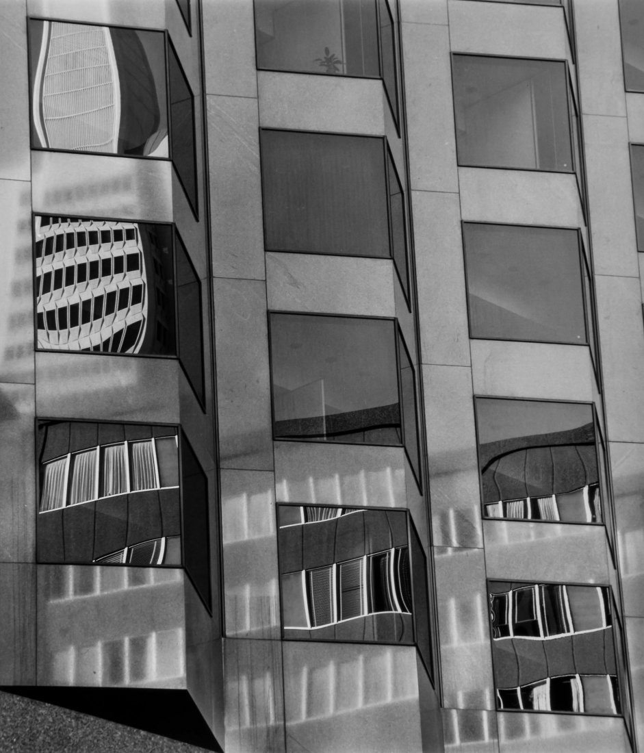 Brett Weston (1911-1993) - Bank of America Building,: Gelatin silver print, printed later, flush mounted to card, signed and dated in pencil on mount recto, stamped portfolio print no.10 verso, 31.6 x 27.1cm (12 x 10 3/4in) ** This lot has been imported 