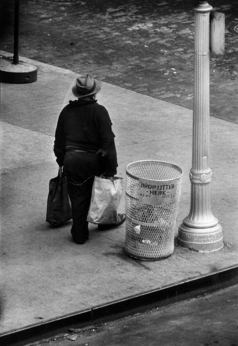 W. Eugene Smith (1918-1978) - Trash Picker Triptych: Three gelatin silver prints, each annotated in unknown hand in pencil with W. Eugene Smith private collection stamp verso, each approximately 34.3 x 24.1cm (13 1/2 x 9 1/2in) Provenance: Christie's Ne