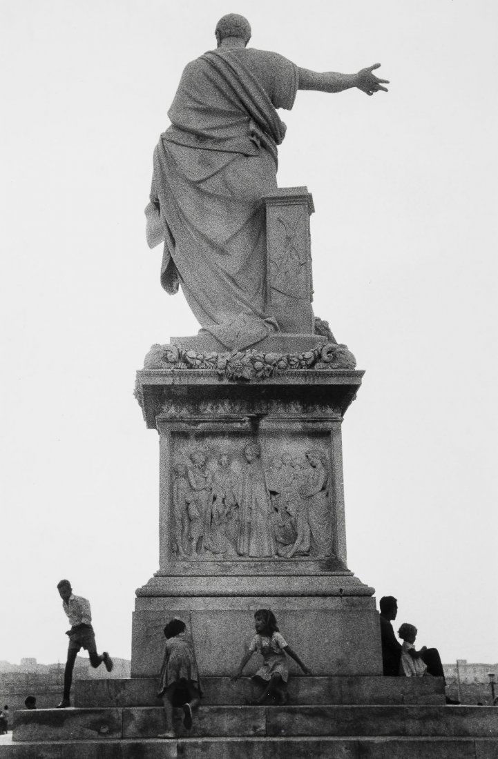 Robert Frank (b.1924) - Back of Statue, Livorno, Italy,: Gelatin silver print, printed on Agfa paper, signed in black ink verso, 35.6 x 27.9cm (14 x 11in)