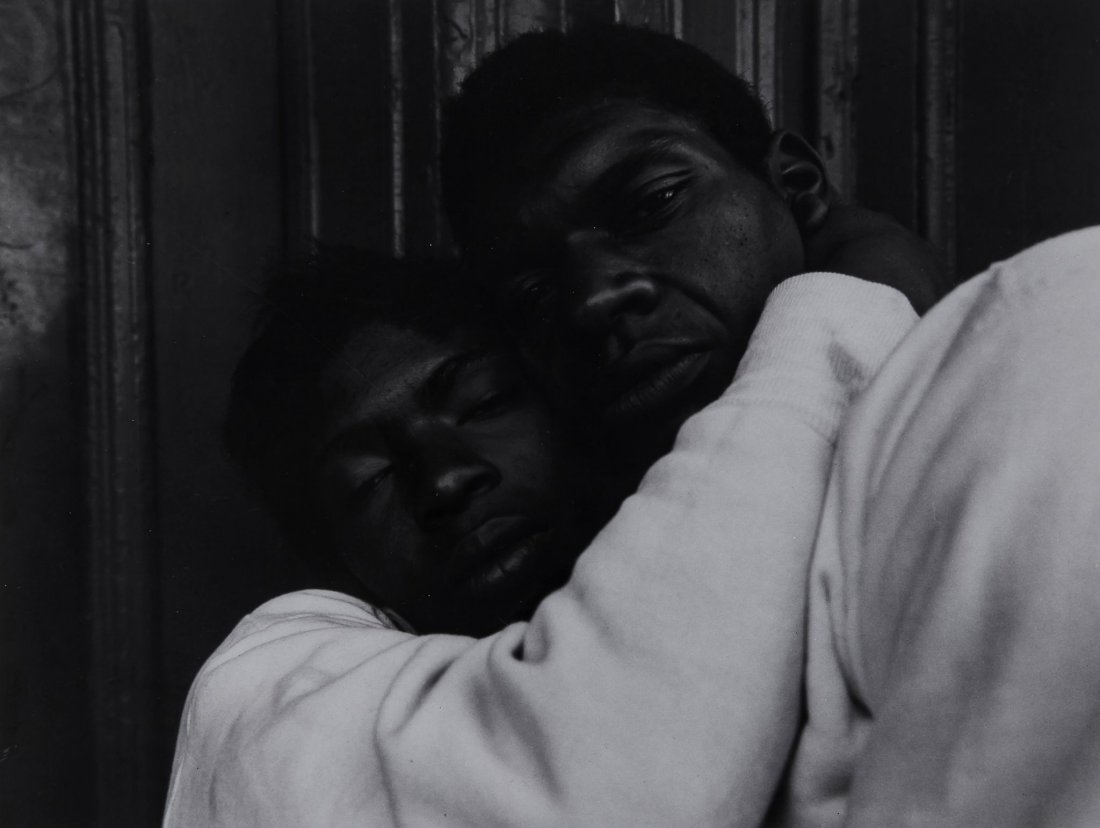 Bruce Davidson (b.1933) - East 100th Street, 1967-68: Gelatin silver print, printed 1970, annotated in black ink in unknown hand in the margin, annotated in pencil in unknown hand with MoMA label affixed verso, 18.6 x 24.2cm (7 3/8 x 9 1/2in) Provenance: