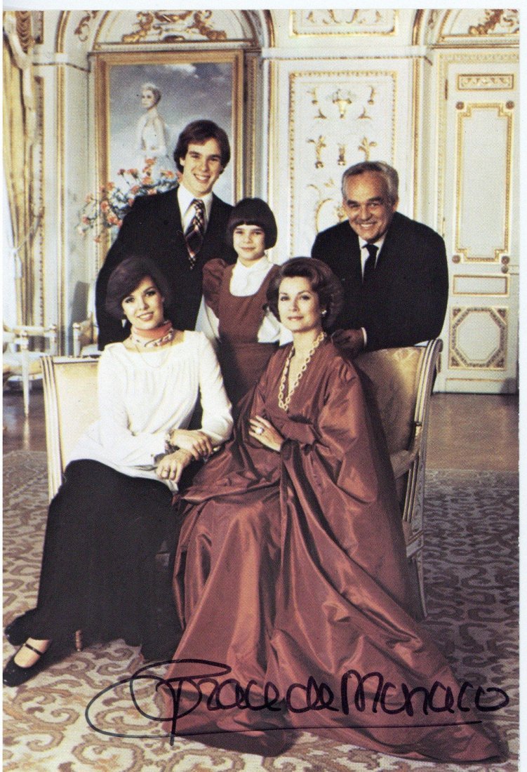 KELLY, GRACE - Colour postcard photograph of Monaco's: Colour postcard photograph of Monaco's Royal family, signed by Kelly as "Grace de Monaco" in black ink across lower margin, 15 x 10.5cm, 1976.