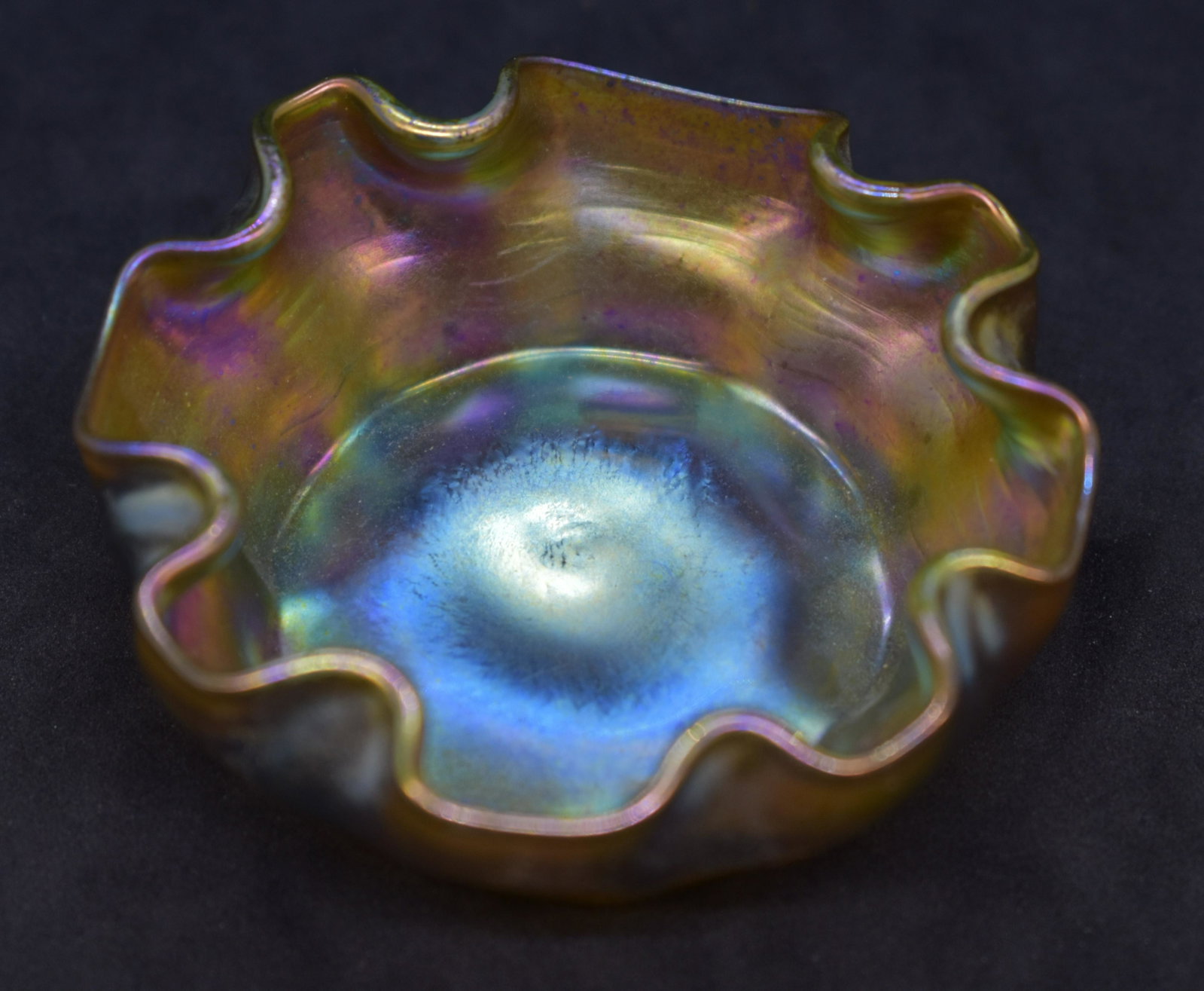Louis C. Tiffany Furnaces Favrile Salt Cellar: Measures 2.75" across x 1" tall. Signed "L.C.T. " on the bottom. See Photos for Details. Shipping Available.