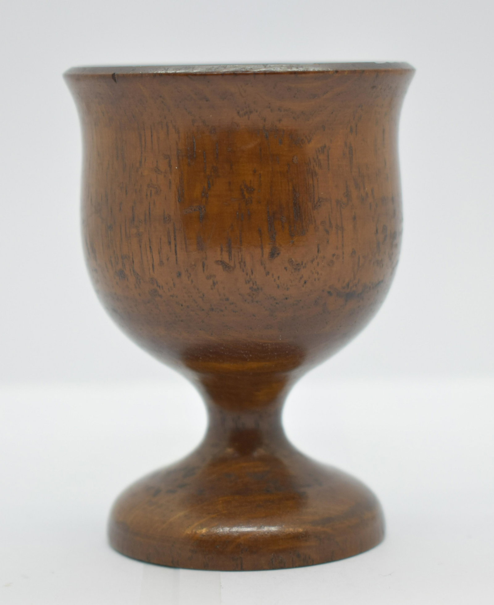 Antique Wooden Chalice Turned from US Frigate: There is a handwritten paper label on the bottom of the chalice dating to about 1900 - 1920 that reads, "Turned from a piece of live oak taken from the U.S. Frigate Constitution by C.B.B. Jr". See Pho