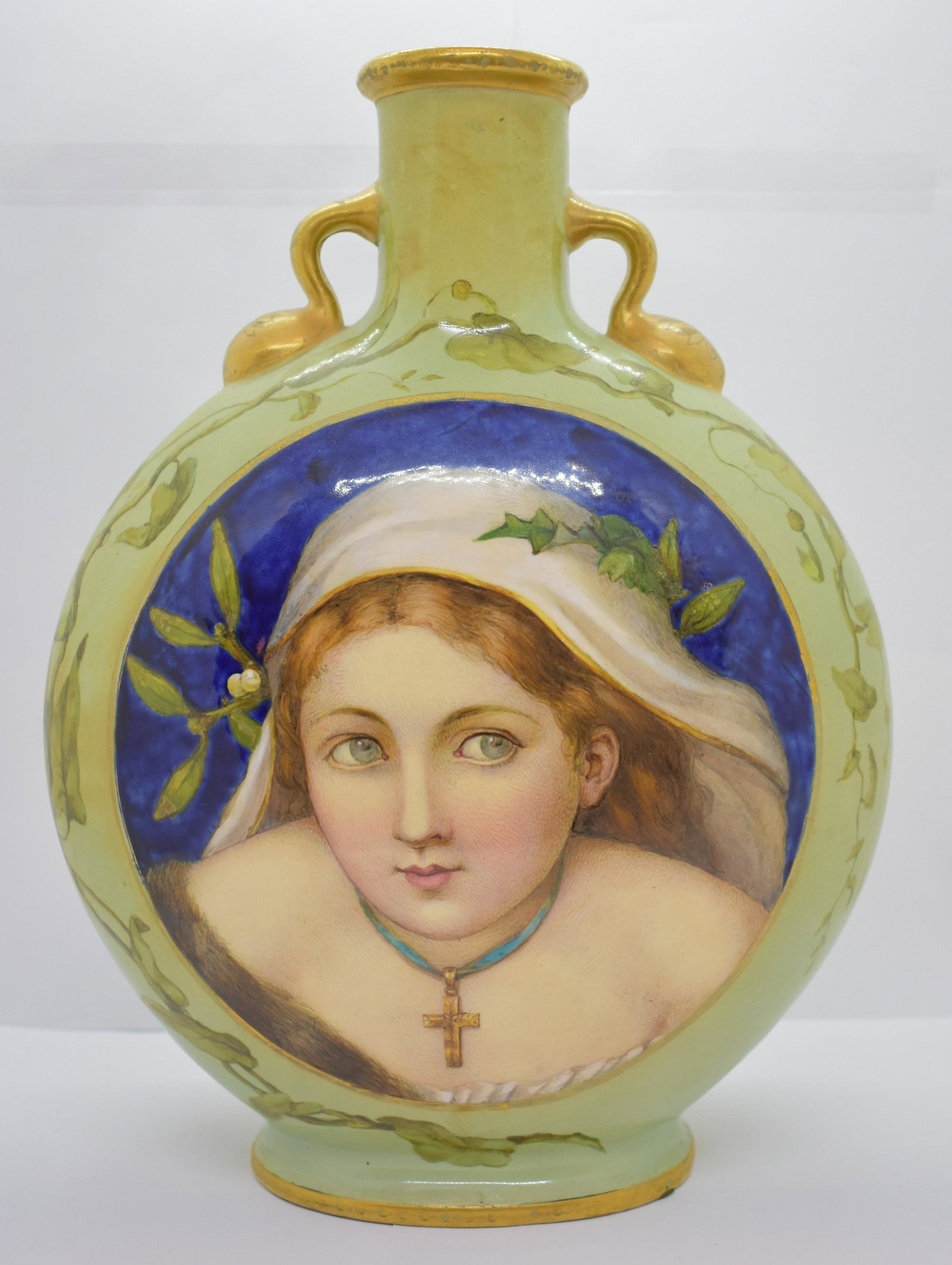 19thc. Victorian Mintons Gilt Moon Flask Vase 1348: Vase features a beautifully executed painted Madonna on the front. Signed "E. Montaila" on the bottom. See Photos for Details. Shipping Available.