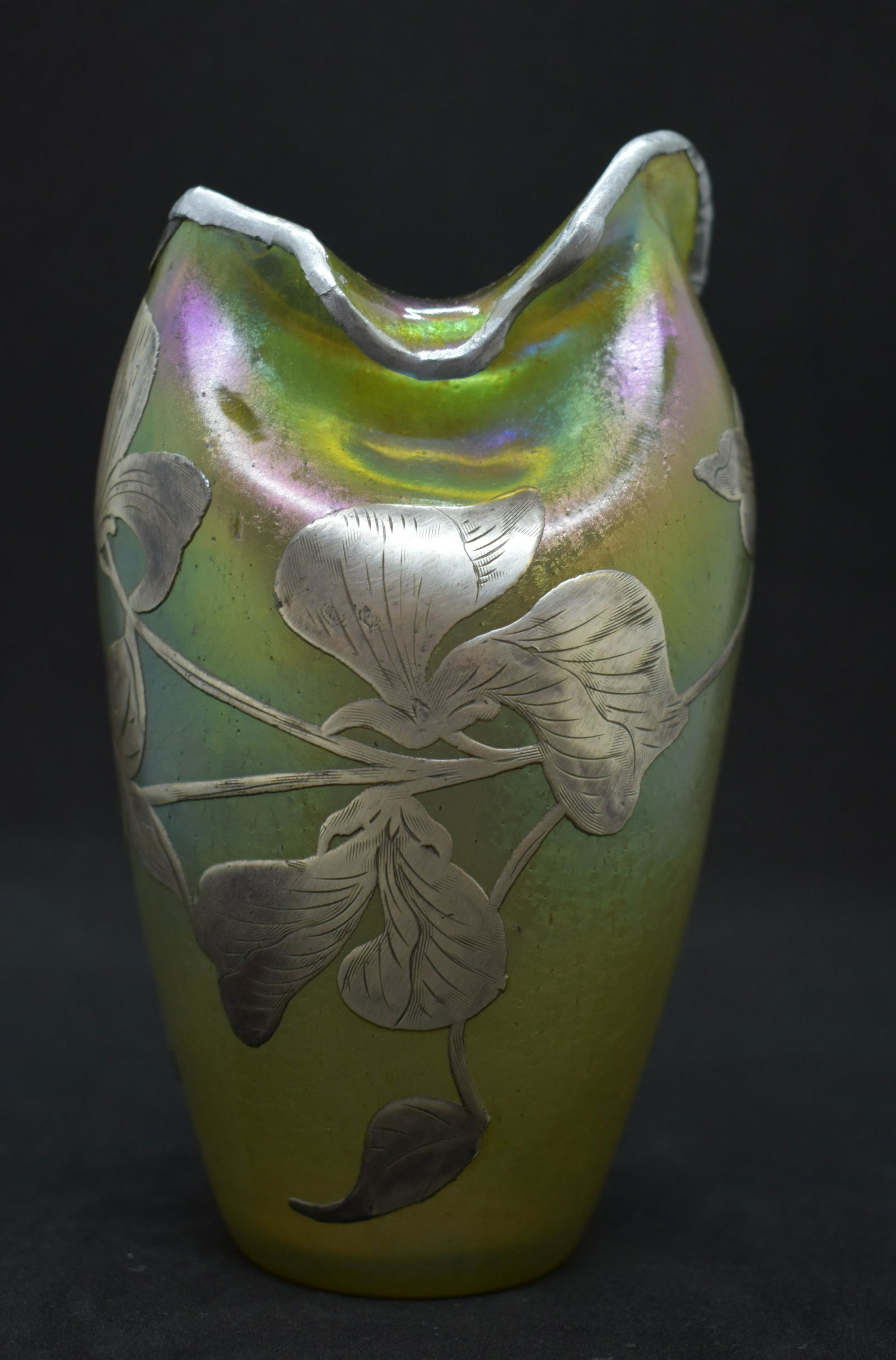 ca. 1895 Loetz Candia Silberiris Overlay Vase: Absolutely gorgeous Loetz silver overlay (Candia Silberiris) iridescent cabinet vase! In researching this piece we have come to the conclusion that the vase was at one time broken (probably a long tim