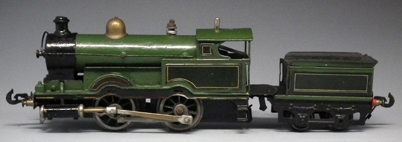 Bassett Lowke 'O' Gauge steam 0-4-0 locomotive and: Bassett Lowke 'O' Gauge steam 0-4-0 locomotive and tender painted in a green livery, the tender bears Lowko transfer, 36cm long Condition report: Some green and black enamel repainting, play wear and