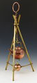 Copper and brass gypsy style spirit kettle, tripod