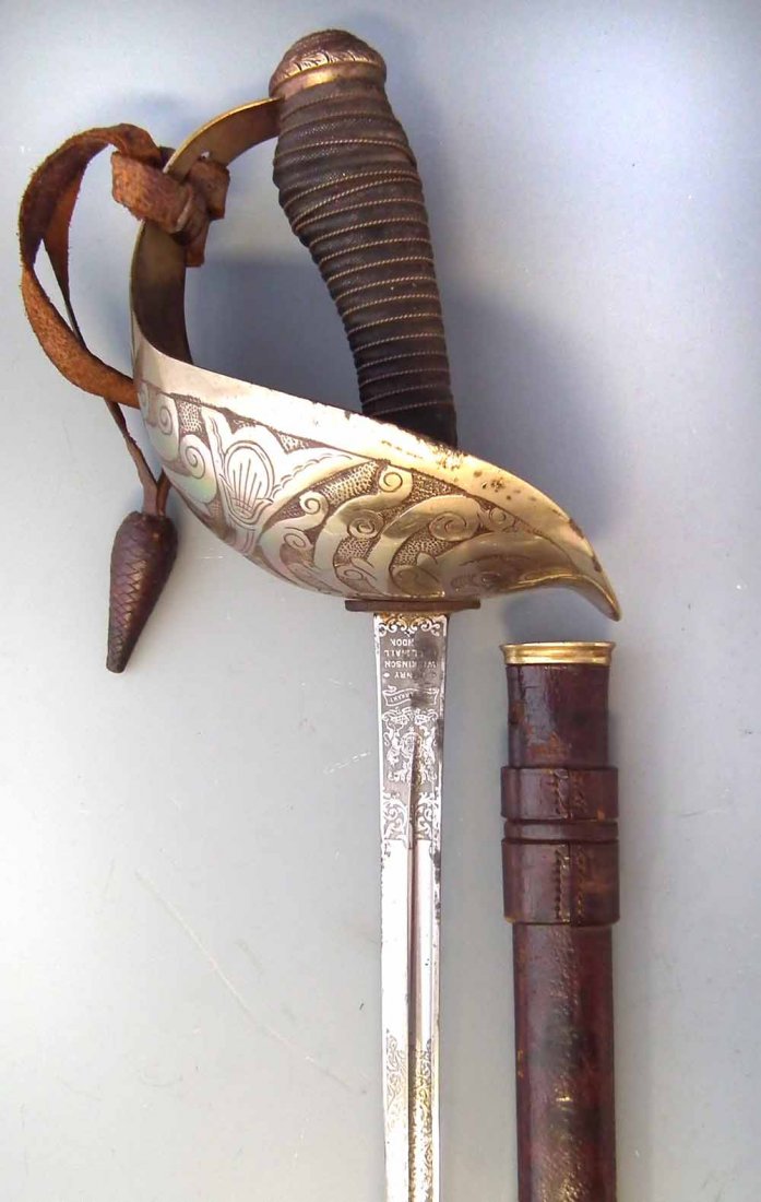 1912 Infantry Officers sword by Wilkinson's, with: 1912 Infantry Officers sword by Wilkinson's, with leather covered scabbard, and knot, 113cm long