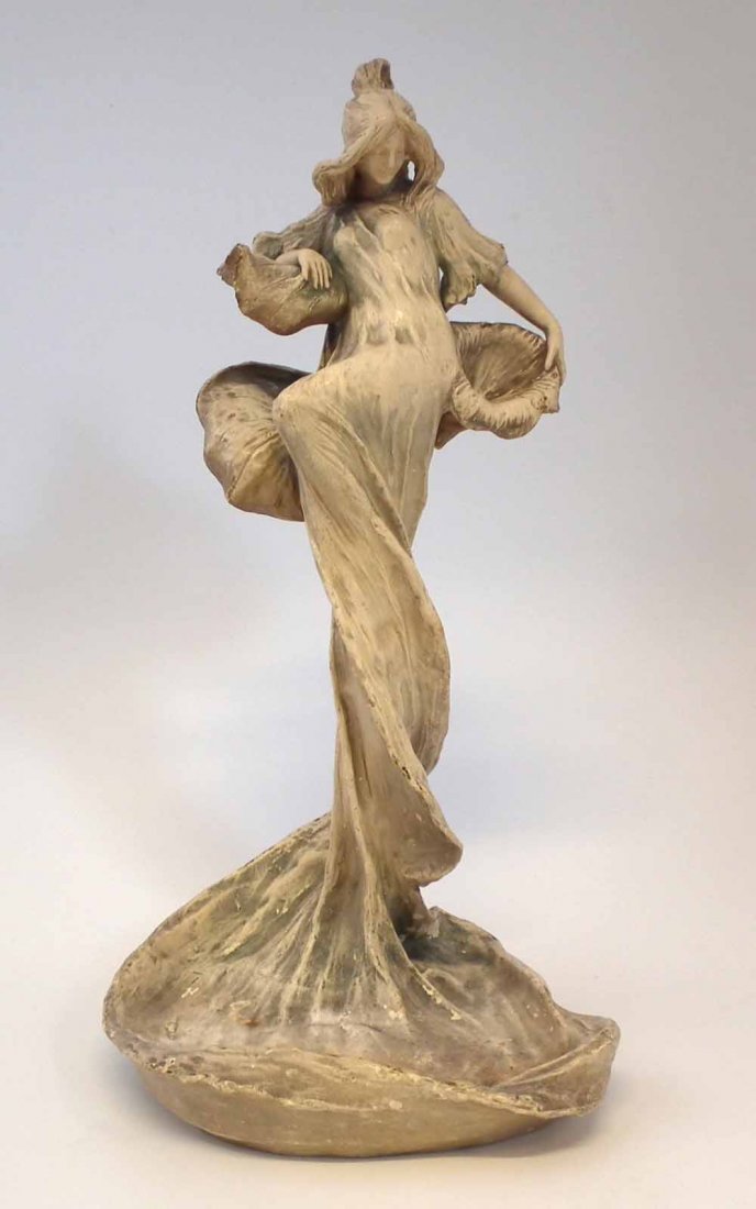 Amphora table centre piece, modelled as an Art: Amphora table centre piece, modelled as an Art Nouveau maiden beside the water's edge, impressed marks to base, 44cm high Condition report: Losses to a flower stalk on the reverse of the figure, overa