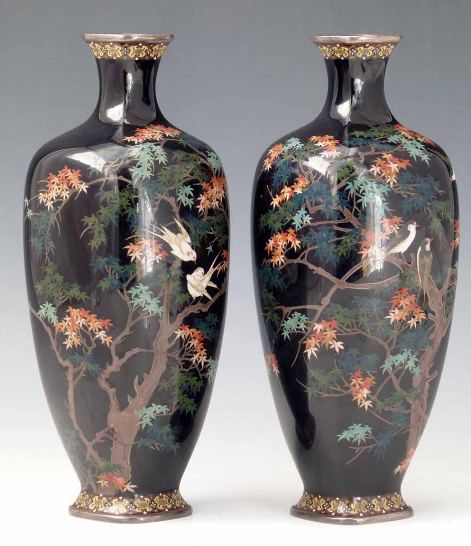 Pair of Japanese cloisonne shouldered vases of squarish: Pair of Japanese cloisonne shouldered vases of squarish section, decorated on the deep blue ground with birds in a maple tree, factory mark to base, height 24cm.